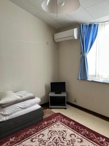 Petit Hotel Koizumi Toyako Екстериор снимка